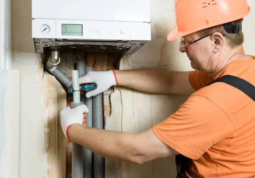 professional-repairman-mounting-water-heating-radiator-home-wall-fixing-problems-with-wate نصب و فروش پکیج و رادیاتور